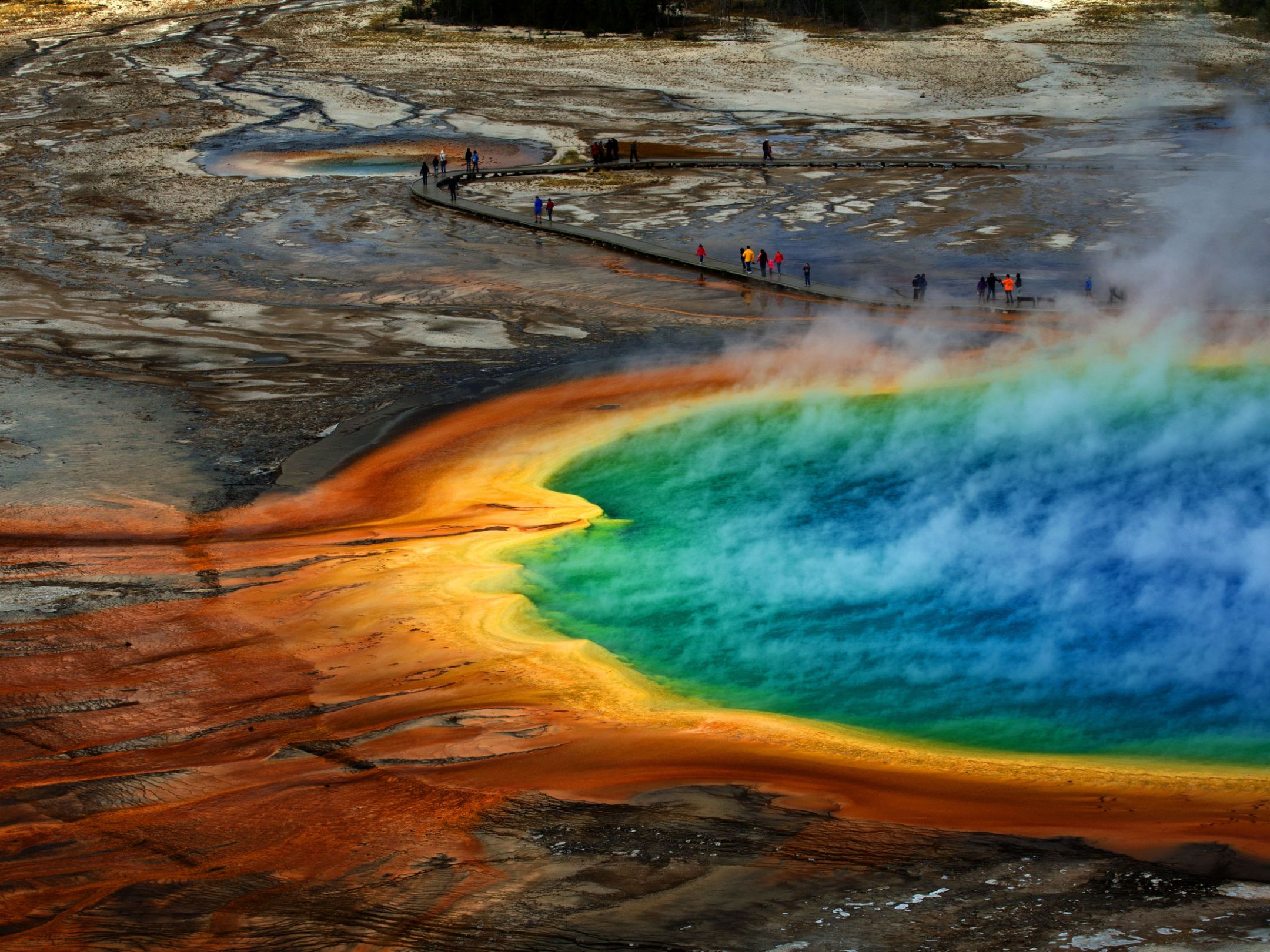 a person riding a wave on a surfboard in the water