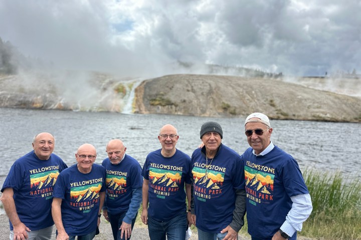 a group of people posing for the camera