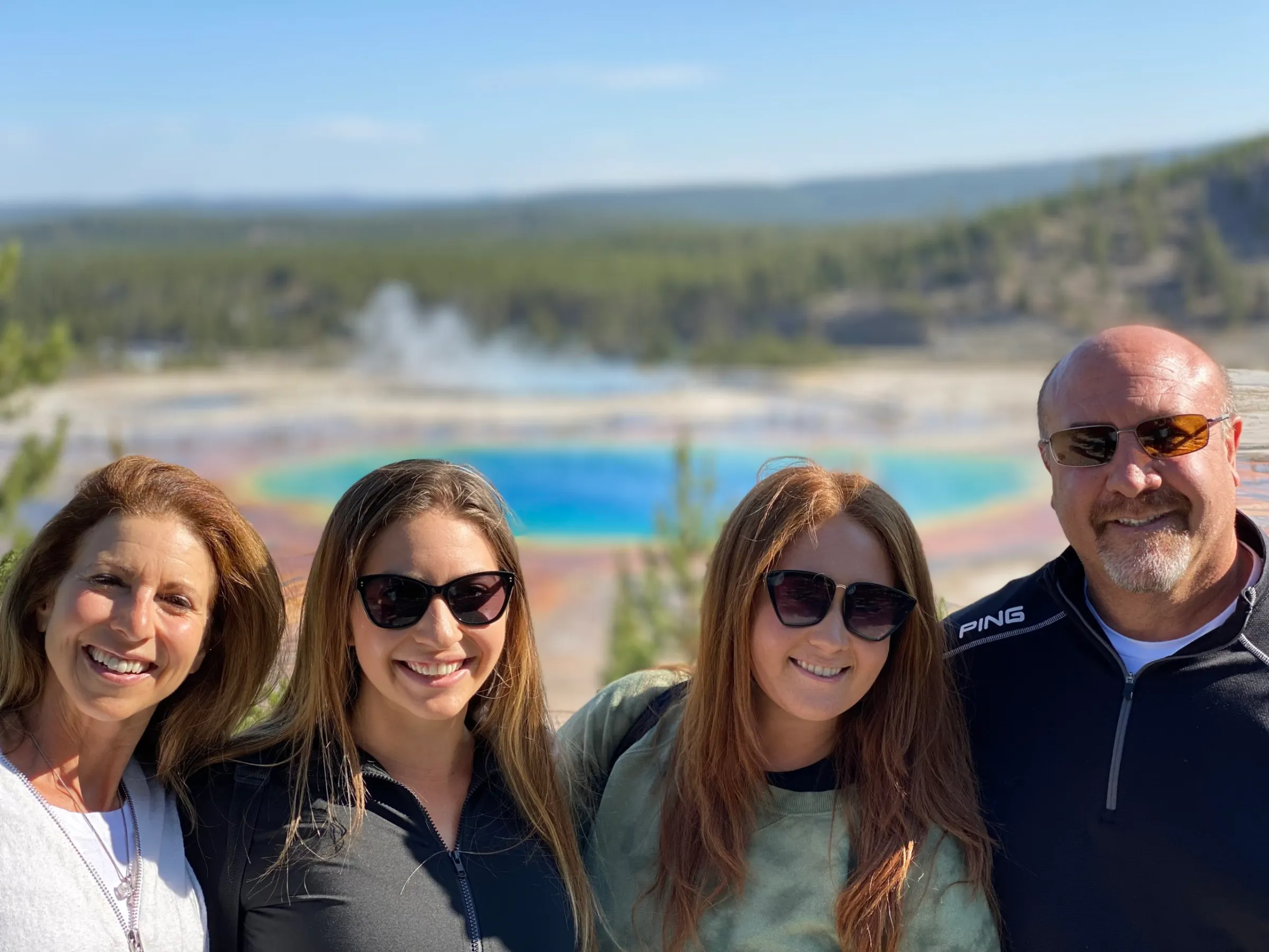 Family at Grand Prismatic Hot Spring in Yellowstone