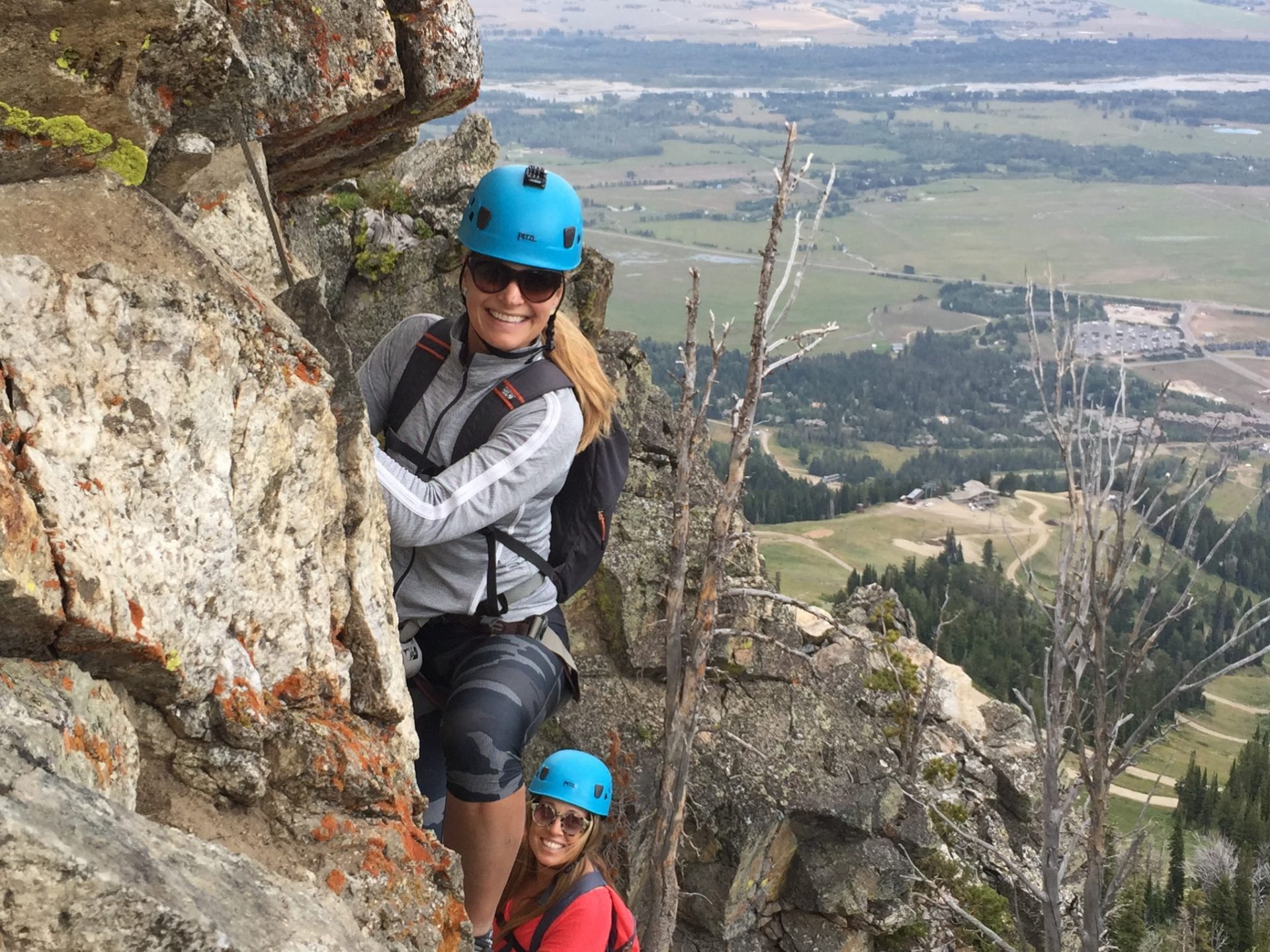 a man standing on a rocky hill