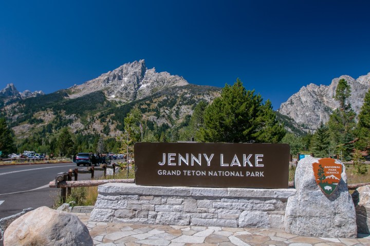 a sign on the side of a mountain