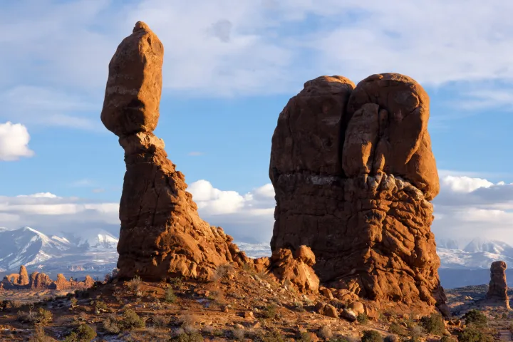 a canyon with Arches National Park in the background