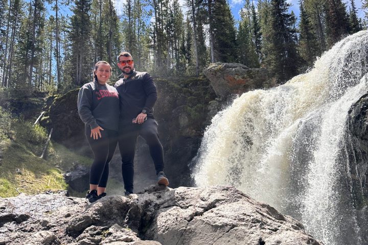 a group of people on a rock