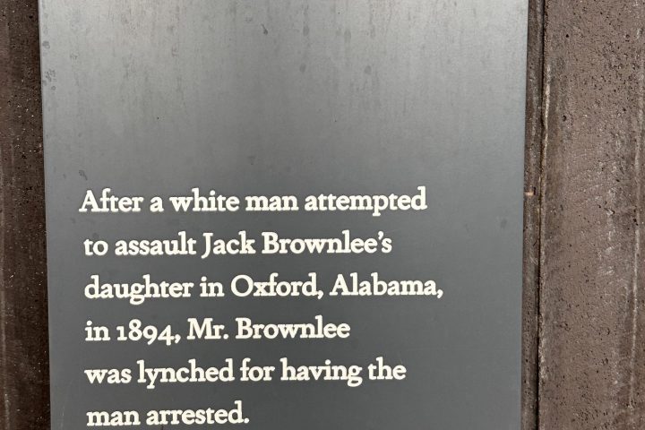 Plaque describing the lynching of Jack Brownlee in 1894 in Oxford, Alabama.